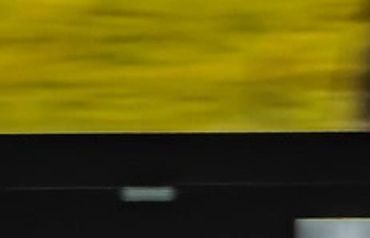 A yellow and black horizontal striped pattern.