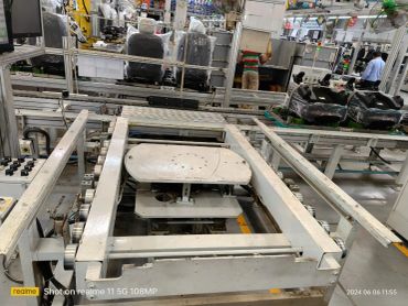 Industrial machinery setup in a factory environment.