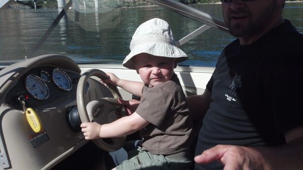 Driving the boat with Uncle Curt