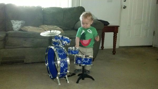 His first drum set!