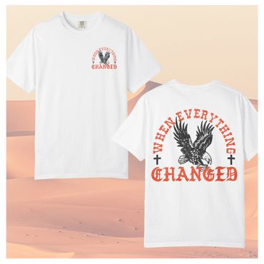 White t-shirt with eagle and text design on front and back.