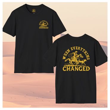 Black T-shirt with yellow text and graphic of a rider and horse, saying 'When Everything Changed'.
