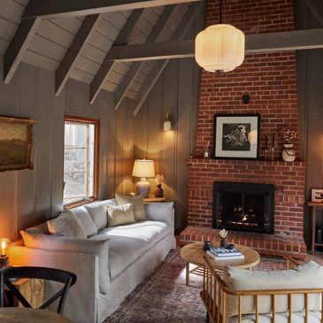 Cozy living room with a fireplace and comfortable seating.