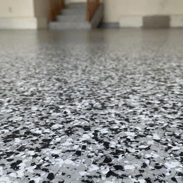 epoxy garage floor, flakes and full color, concrete grinding