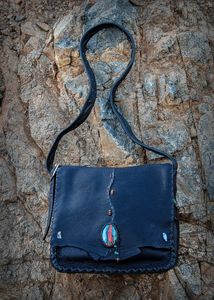 Hand sewn Elk and Buffalo hide leather bag with a Sonoran Sunset stone.