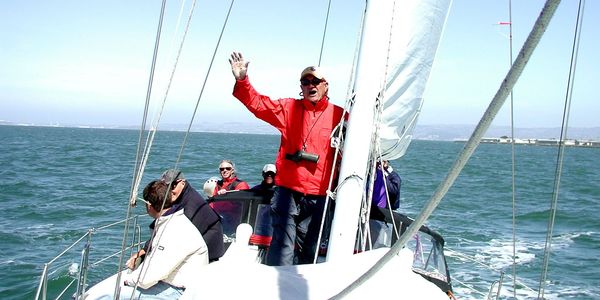 man yelling on sailboat