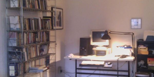 Decluttered and organized home office with a little work left to be done