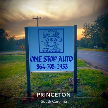 Signboard for One Stop Auto in Princeton, South Carolina at sunset.