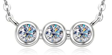 Moissanite and Sterling Silver three stone necklace
