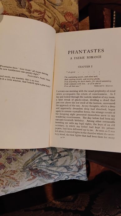 Open book showing text from Phantastes by George MacDonald.