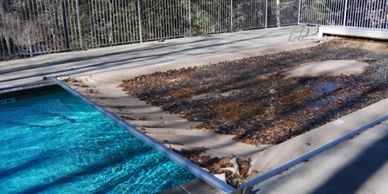 pool cover with leaves on it