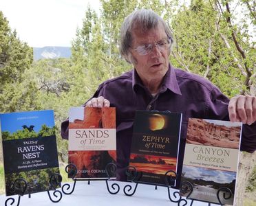 Author Joseph Colwell with his beautiful books of essays and fiction. 