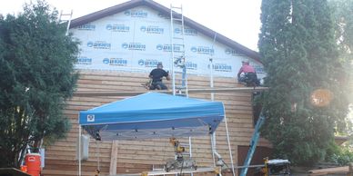 New siding, wood panel siding, new construction, Cedar Rapids. Ia.