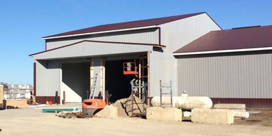new construction, pole barn, metal siding.