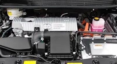 Close-up of a Toyota Hybrid Synergy Drive engine compartment.