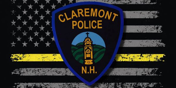 Claremont Police patch on a black and white American flag with a yellow line.
