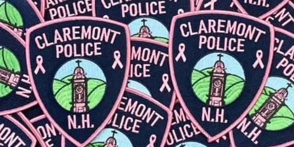 Claremont Police N.H. patches with pink ribbons for breast cancer awareness.