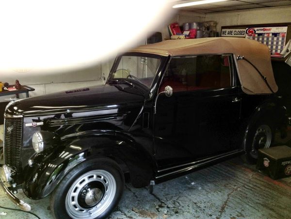 Vintage car in process of full restoration in a small workshop