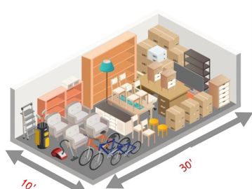 A 10x30 storage unit filled with furniture, boxes, and bicycles.