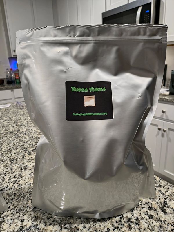 Silver foil bag labeled Bugga Sugga.
