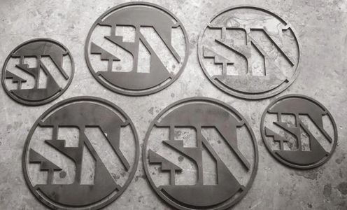 plasma cut signs in fabrication shop