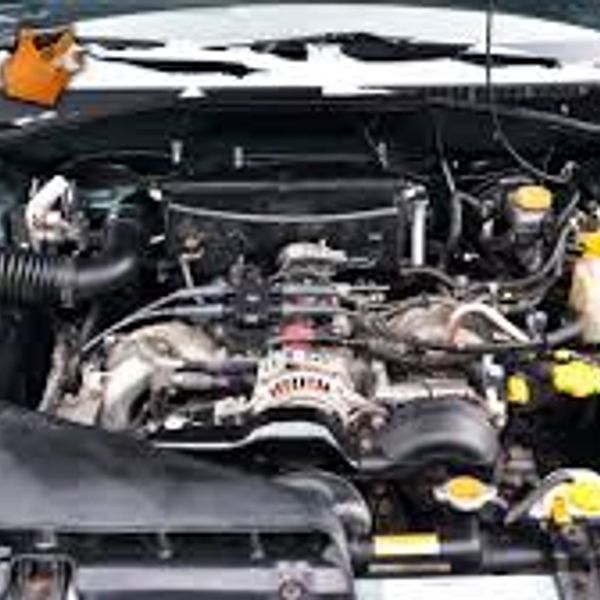 Car engine with open hood showing components.