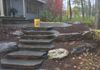 AFTER-Stone stair installation with surrounding garden beds
