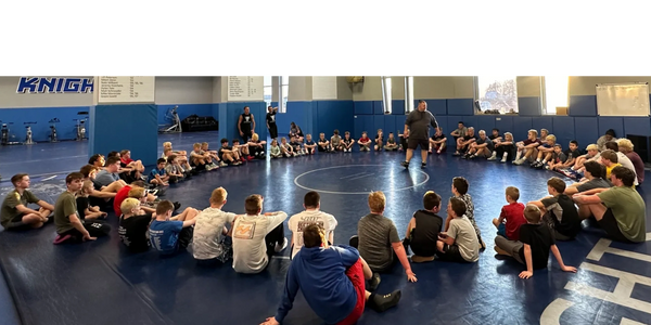 group of kids sitting in round circle