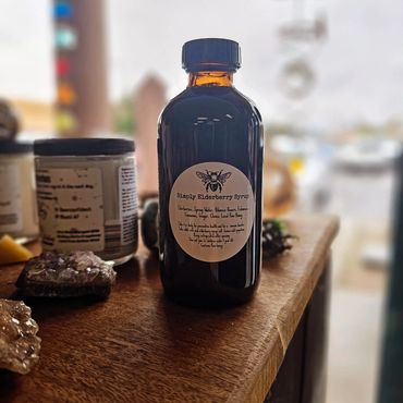 Simply Elderberry syrup bottle for natural wellness and health.

