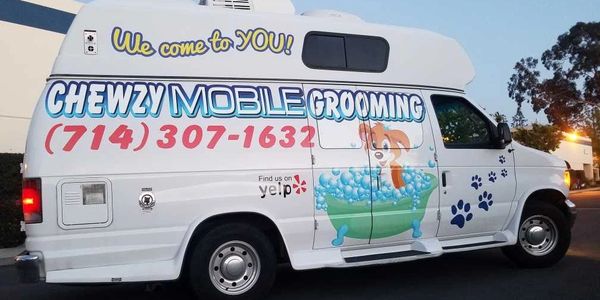 Our vans are complete, self-contained, professional grooming salons on wheels.