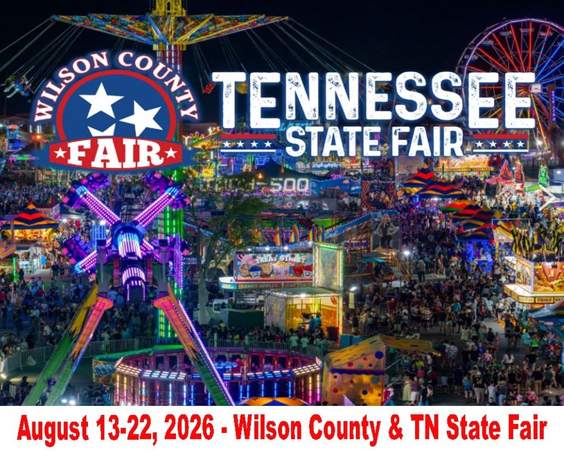 Wilson County and Tennessee State Fair at night with rides and crowds.