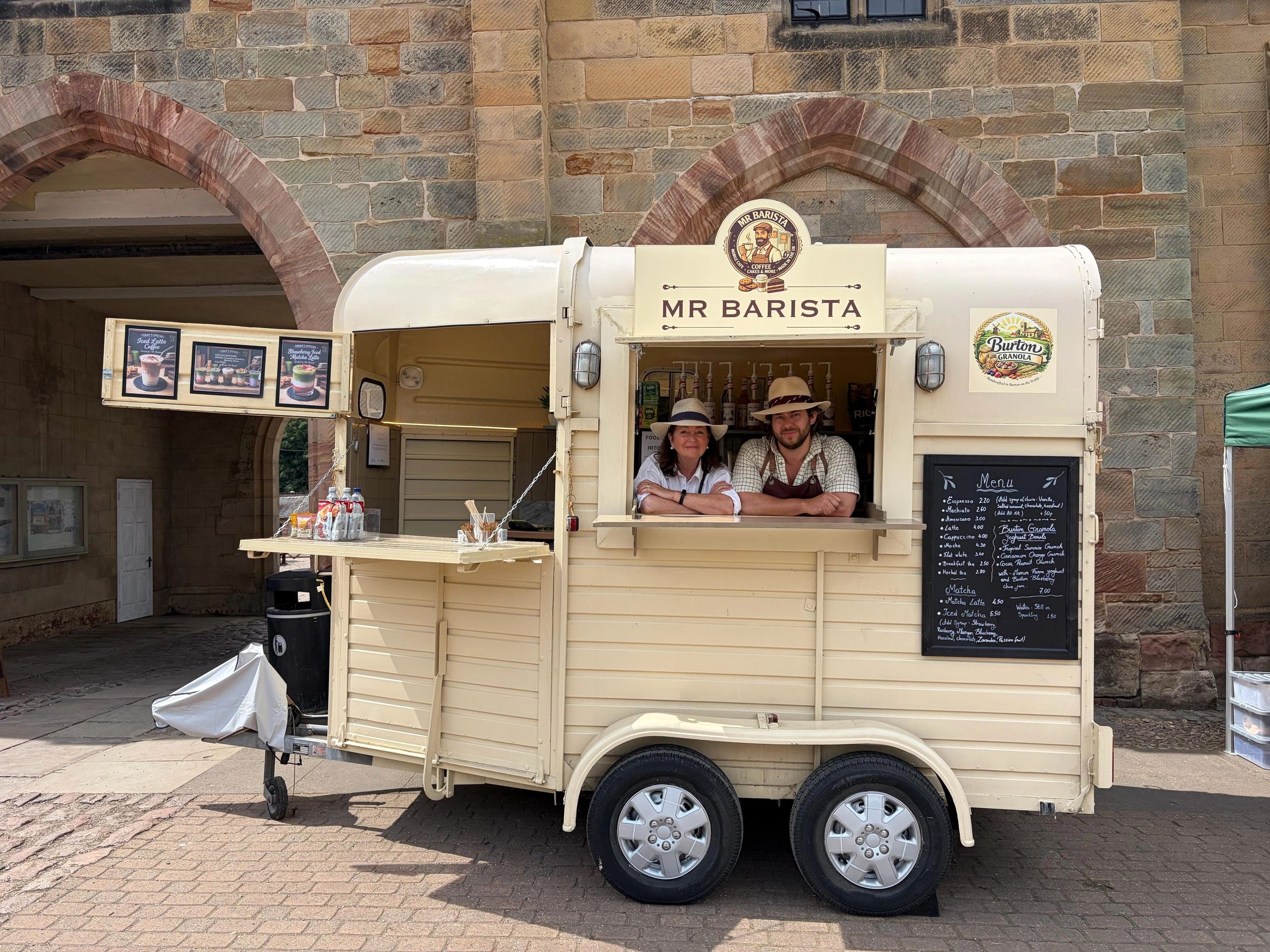 Coffee truck with two baristas.