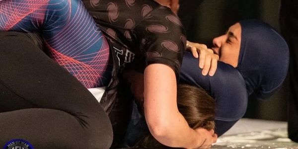 Two Women Training Jiu Jitsu