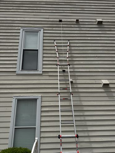Duct cleaning with 17 foot extension ladder.