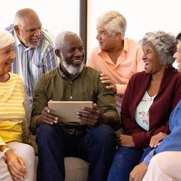 Group of happy seniors enjoying time together indoors.