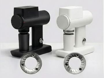 Black and white manual coffee grinders with blade burrs.