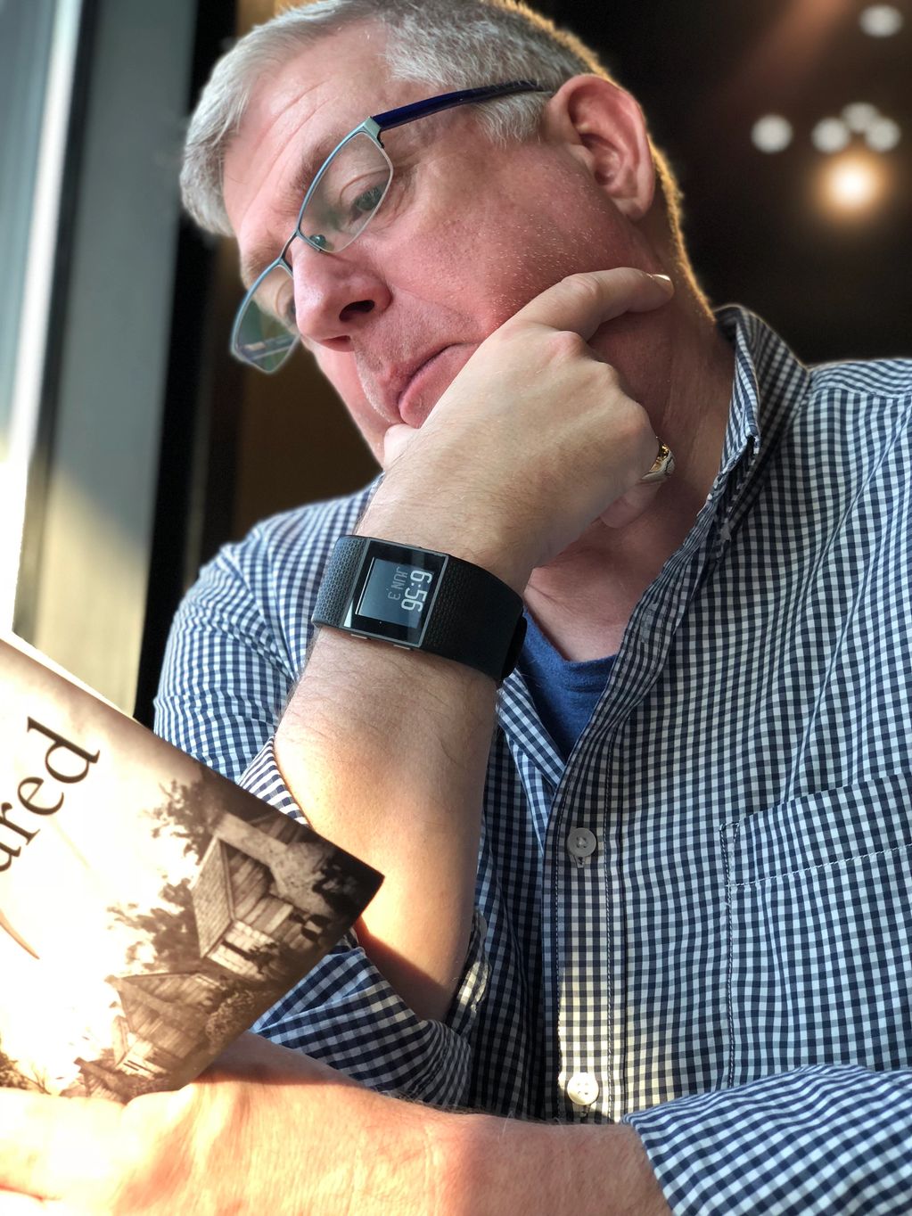 St.John Flynn reading Octavia Butler's Kindred at the coffee shop, Houston, June 2018.