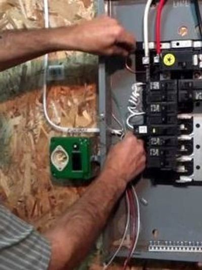 Cat General Contracting electrical panel for an addition of hot tub.