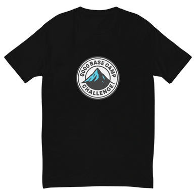 Black t-shirt with a circular mountain and text design on the chest.