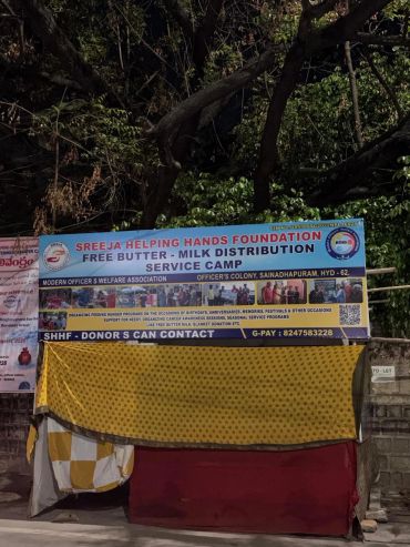 Sreeja Helping Hands Foundation free butter-milk distribution camp banner.
