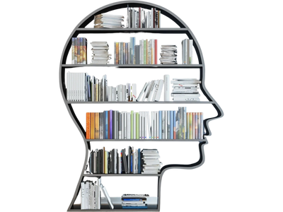 A silhouette of a man's head with books on a bookshelf inside of the silhouette.