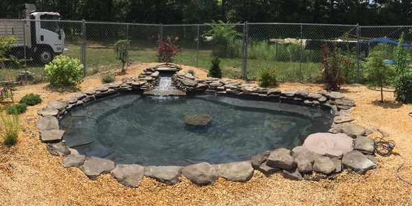 Outdoor koi pond built & designed