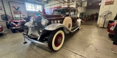 Vintage classic car in a garage.