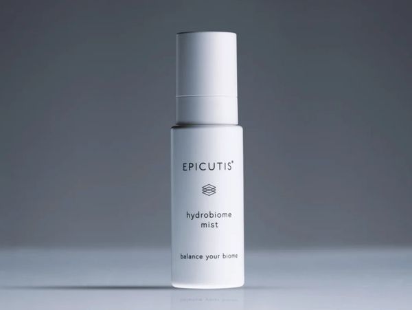 Epicutis Hydrobiome Mist bottle on a gray background.
