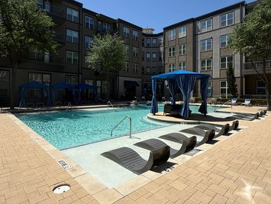 Apartment complex pool remodeling with white plaster in Frisco.