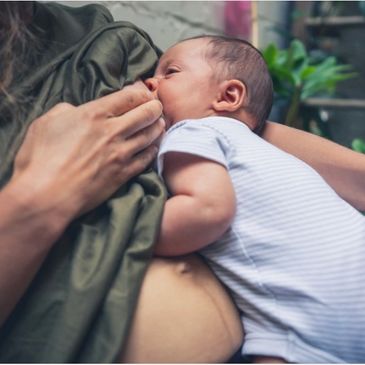 Reclined breastfeeding position gives breastfeeding moms neck and back support!