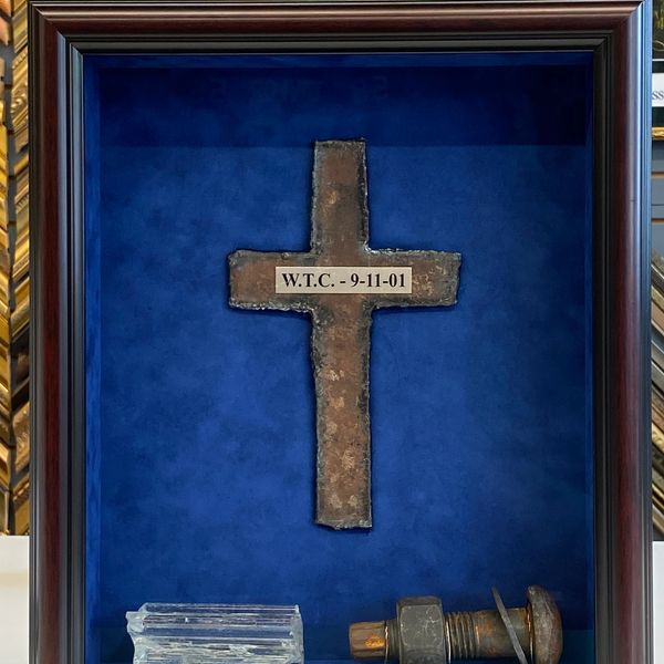 Framed World Trade Center steel cross artifact 9/11 memorial display custom framing Chatham NJ.