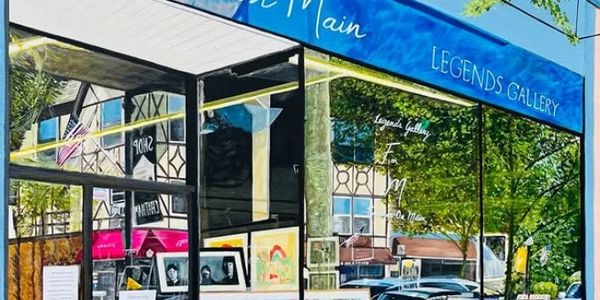 Maria Brann painting displayed in window at Frames on Main Legends Gallery