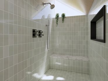 Modern tiled shower with built-in bench and skylight.