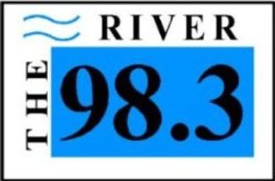 Logo for radio station The River 98.3 with blue water waves.